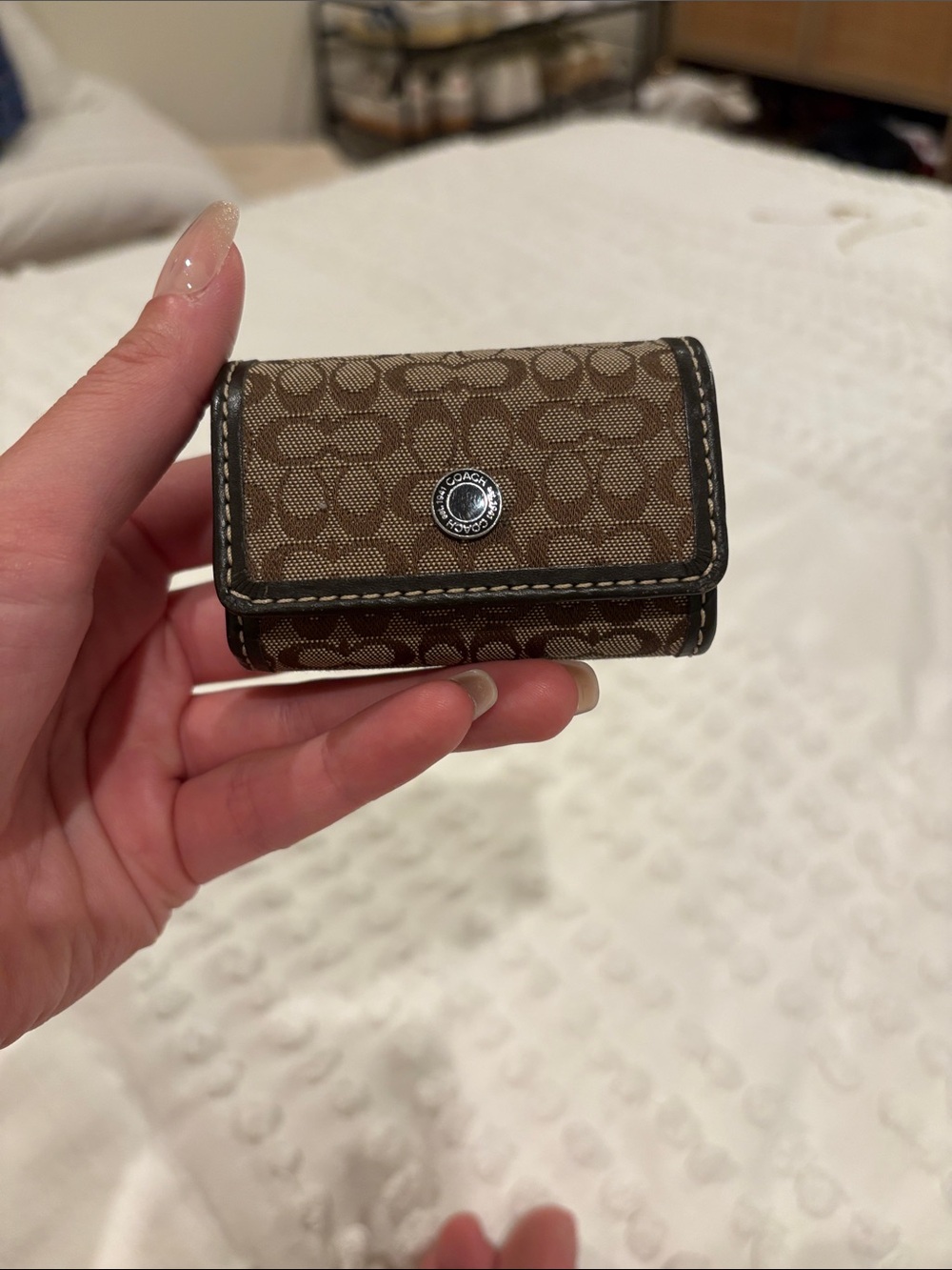 Coach Signature Canvas contact lens holder in Brown